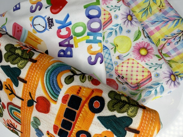 Back to School fabric stack with school bus and apple prints