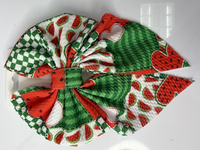 Finished handmade watermelon and green gingham sailor hair bow sewn from bullet liverpool knit fabric