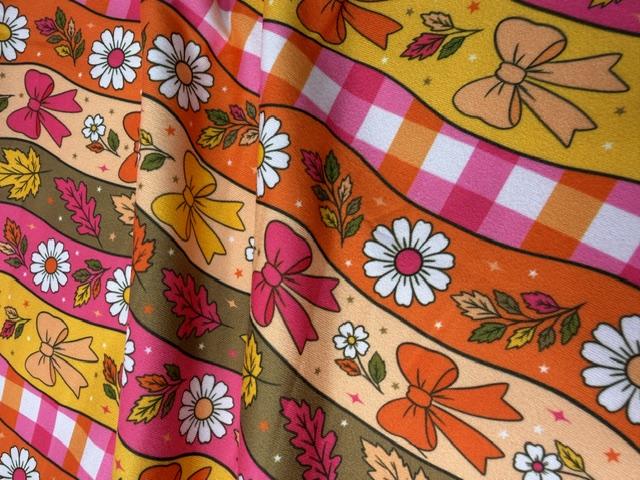 Retro bows and daisies autumn fabric