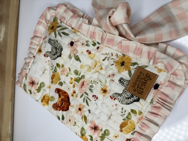 Full view of a handmade quilted Bible and journal cover with ruffle trim and matching tie — Bible covers, journal covers, handmade unique gifts